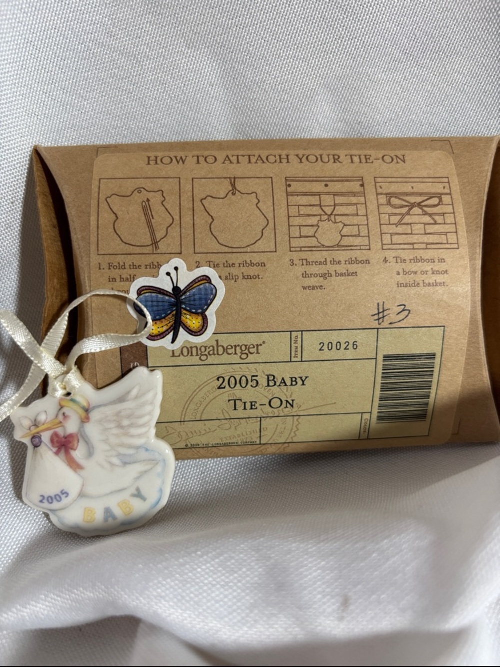 Longaberger 2005 Baby Tie-On Ornament - White with Pastel Accents
